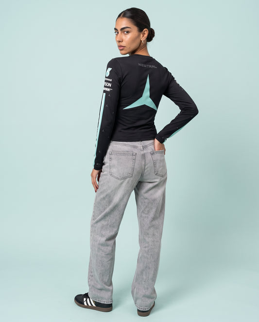 Newtral Mercedes-AMG Petronas women's long-sleeve top in black, back view with the teal star