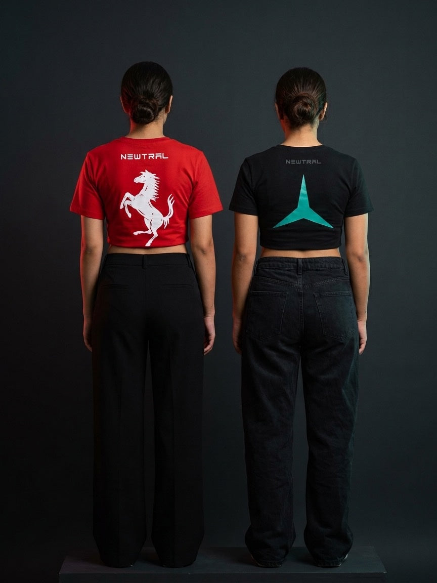 Ferrari Scuderia Women's Crop Tee (Red) and Mercedes-AMG Petronas Women's Longsleeve Crop (Black) bundle: Back view, both models, plain uniform dark studio, no set pieces