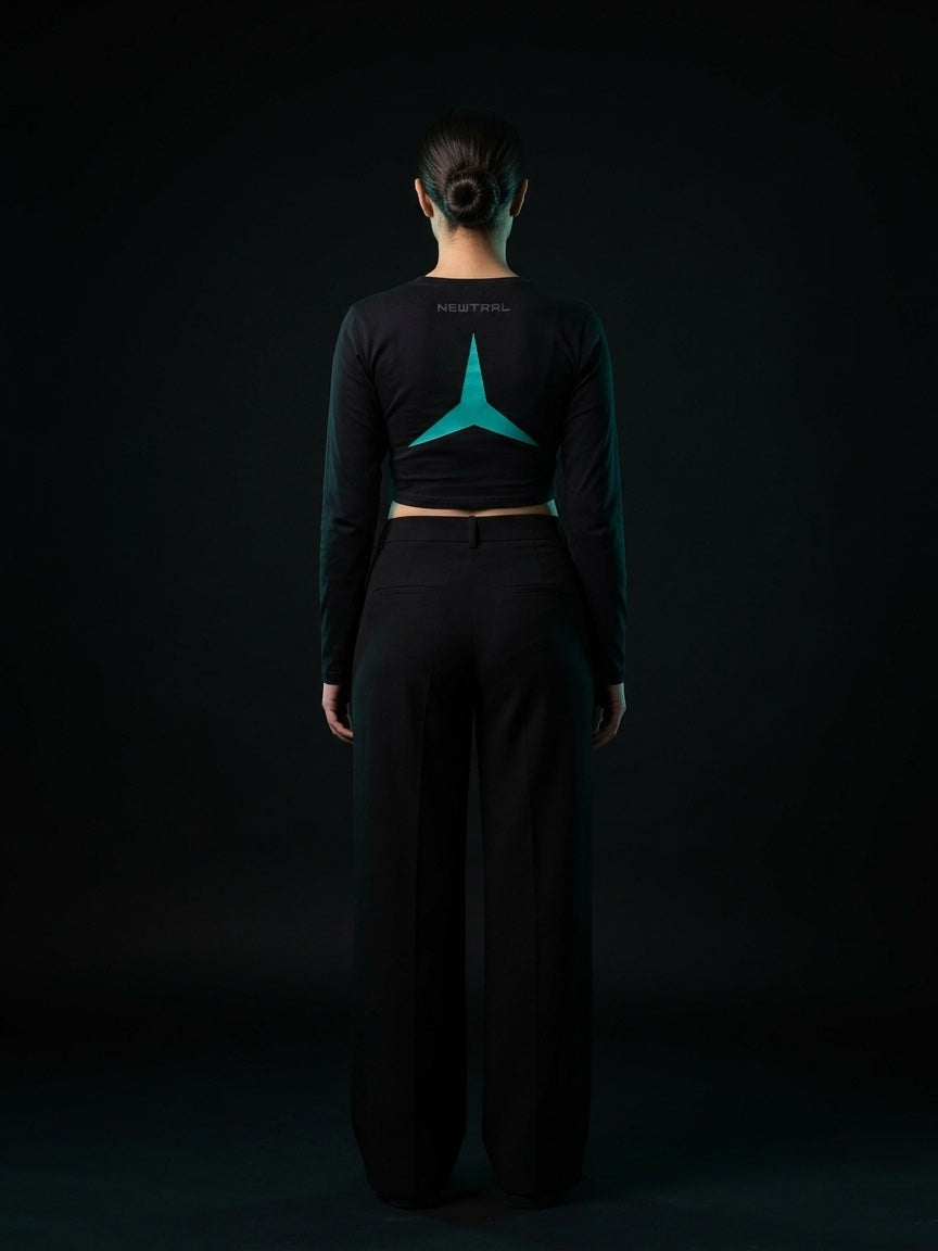 Newtral Mercedes-AMG Petronas women's long-sleeve top in black, back view with the teal star, full body, studio