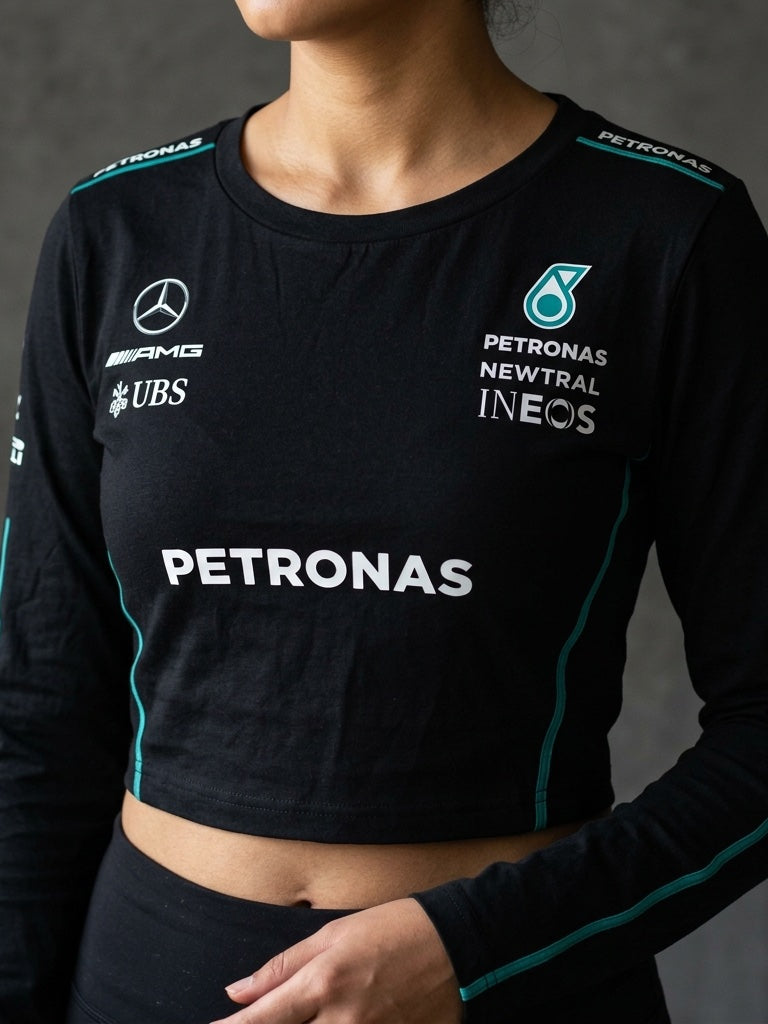 Newtral Mercedes-AMG Petronas women's long-sleeve top in black, chest print close-up